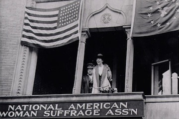 A sign for the National American Woman Suffrage Association at a rally